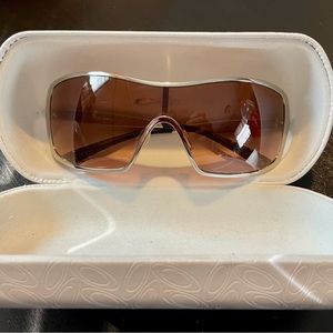 Oakley Remedy Sunglasses Polished Chrome Frames and Pink Tinted Lenses